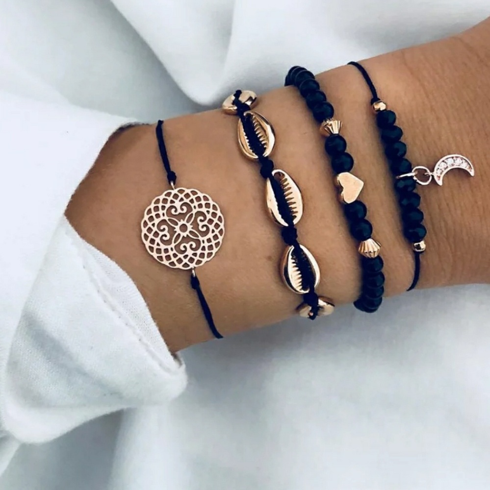 🆕4 piece Black & gold bracelet set